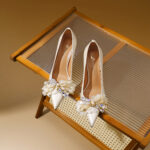 SIMONE Pearlescent Patent Stiletto Pumps | Handcrafted Crystal Bow 8cm Heels